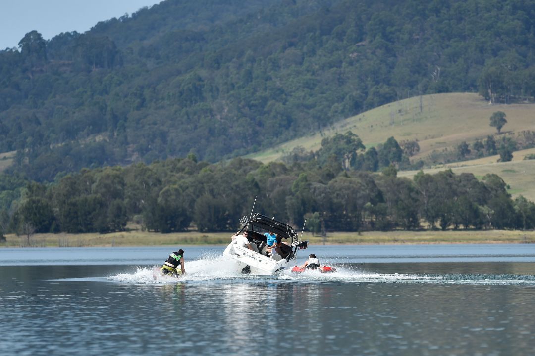 Wakeboarding behind boat